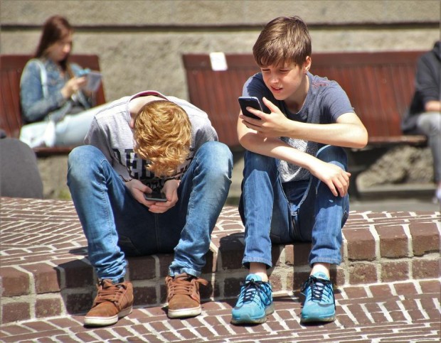 Boys on Mobiles